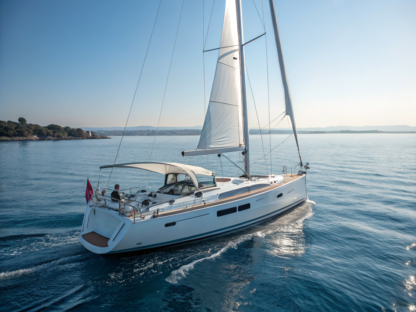 Open ocean sailing wake on deep blue water